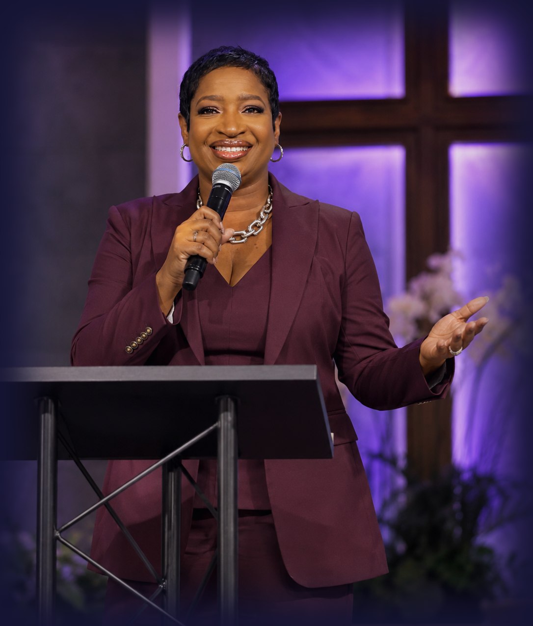 Pastor Kim Whyatt speaking on stage